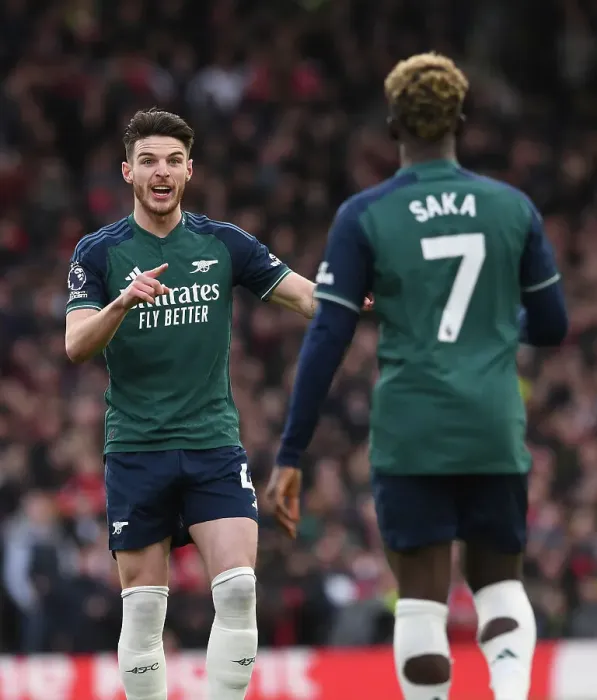 Framed Print : 2023-24 Premier League: Bukayo Saka and Declan Rice Share Strategies on the Field during Fulham vs. Arsenal