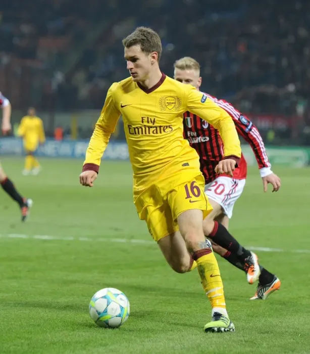 Framed Print : Aaron Ramsey: In Action Against AC Milan, UEFA Champions League 2012