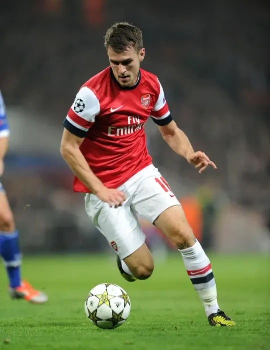 Framed Print : Aaron Ramsey: In Action for Arsenal Against Schalke 04, UEFA Champions League 2012-13 Framed Print : Aaron Ramsey: In Action for Arsenal Against Schalke 04, UEFA Champions League 2012-13