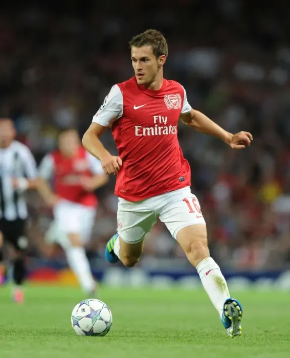 Framed Print : Aaron Ramsey: In Action for Arsenal against Udinese, UEFA Champions League Play-Off, 2011 Framed Print : Aaron Ramsey: In Action for Arsenal against Udinese, UEFA Champions League Play-Off, 2011
