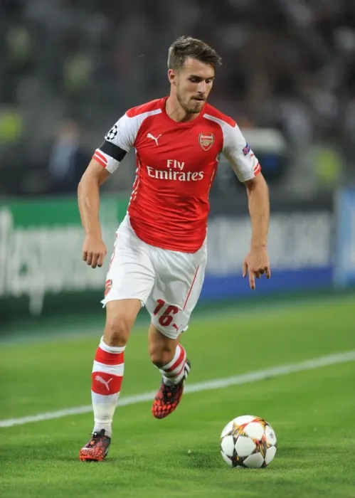 Framed Print : Aaron Ramsey in Action: Arsenal vs. Besiktas, UEFA Champions League Qualifiers 2014 Framed Print : Aaron Ramsey in Action: Arsenal vs. Besiktas, UEFA Champions League Qualifiers 2014