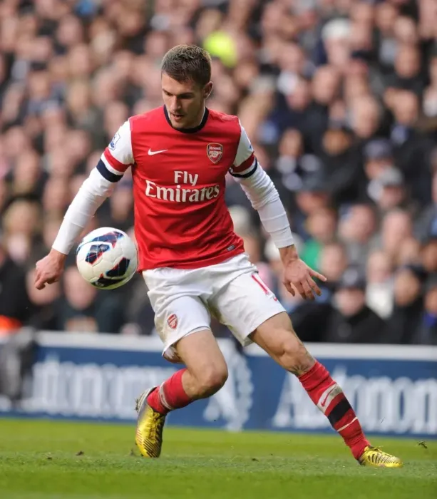 Framed Print : Aaron Ramsey in Action: Arsenal vs. Tottenham Rivalry, Premier League 2012-13