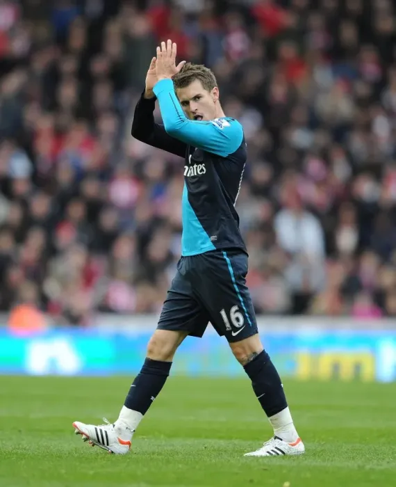 Framed Print : Aaron Ramsey in Action: Stoke City vs. Arsenal, Premier League 2011-12