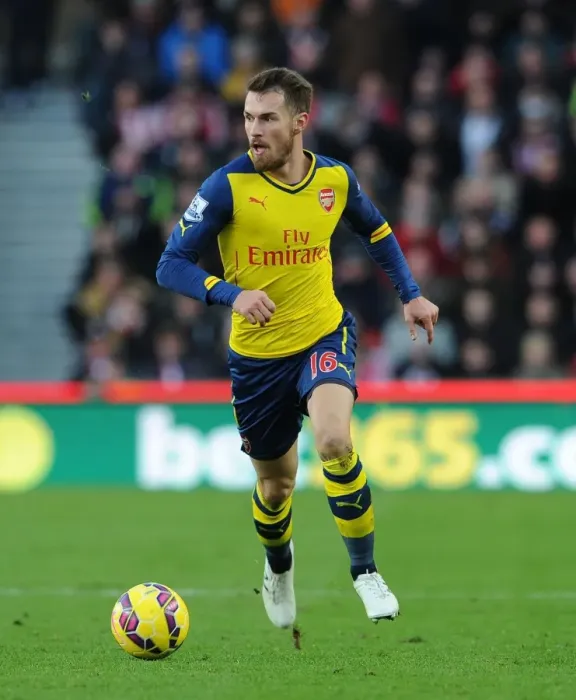 Framed Print : Aaron Ramsey in Action: Stoke City vs Arsenal, Premier League 2014-15
