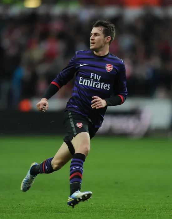 Framed Print : Aaron Ramsey in Action: Swansea v Arsenal - FA Cup Third Round Framed Print : Aaron Ramsey in Action: Swansea v Arsenal - FA Cup Third Round