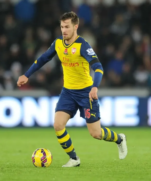 Framed Print : Aaron Ramsey in Action: Swansea vs Arsenal, Premier League 2014-15 Framed Print : Aaron Ramsey in Action: Swansea vs Arsenal, Premier League 2014-15