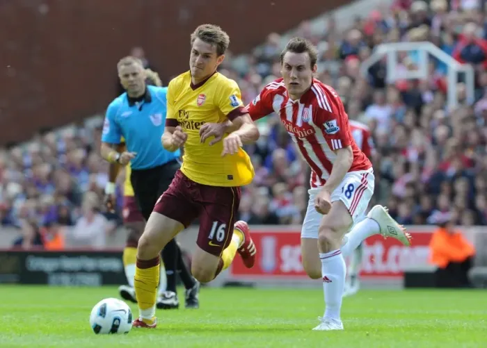 Framed Print : Aaron Ramsey (Arsenal) Dean Whitehead (Stoke). Stoke City 3: 1 Arsenal. Barclays Premier League Framed Print : Aaron Ramsey (Arsenal) Dean Whitehead (Stoke). Stoke City 3: 1 Arsenal. Barclays Premier League