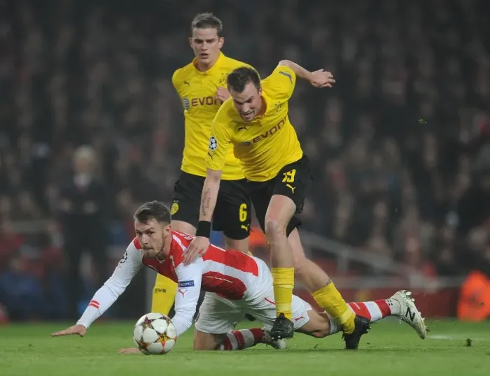 Framed Print : Aaron Ramsey (Arsenal) Kevin Grosskreutz (Dortmund). Arsenal 2: 0 Borussia Dortmund Framed Print : Aaron Ramsey (Arsenal) Kevin Grosskreutz (Dortmund). Arsenal 2: 0 Borussia Dortmund