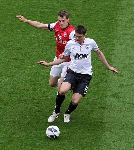 Aaron Ramsey (Arsenal) Michael Carrick (Man Utd). Arsenal 1: 1 Manchester United