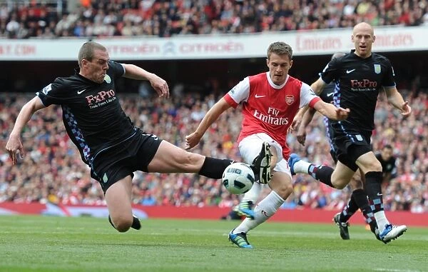 Aaron Ramsey (Arsenal) Richard Dunne (Aston Villa). Arsenal 1: 2 Aston Villa