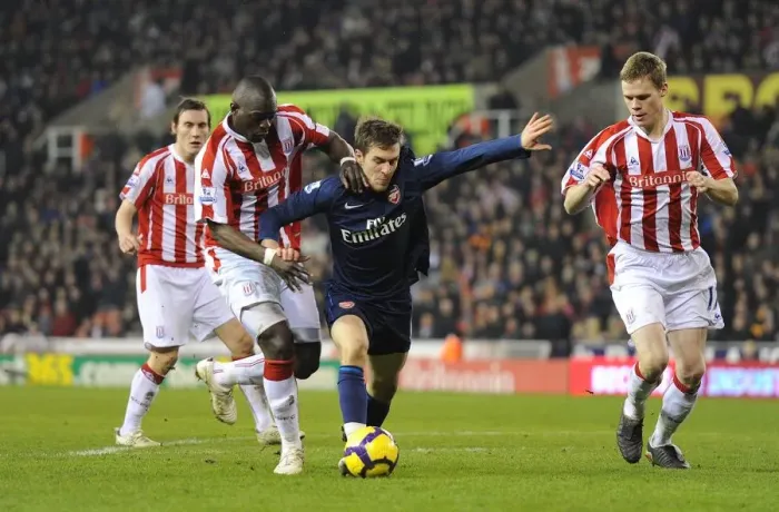 Framed Print : Aaron Ramsey (Arsenal) Ryan Shawcross and Abdoulaye Faye (Stoke). Stoke City 1: 3 Arsenal Framed Print : Aaron Ramsey (Arsenal) Ryan Shawcross and Abdoulaye Faye (Stoke). Stoke City 1: 3 Arsenal