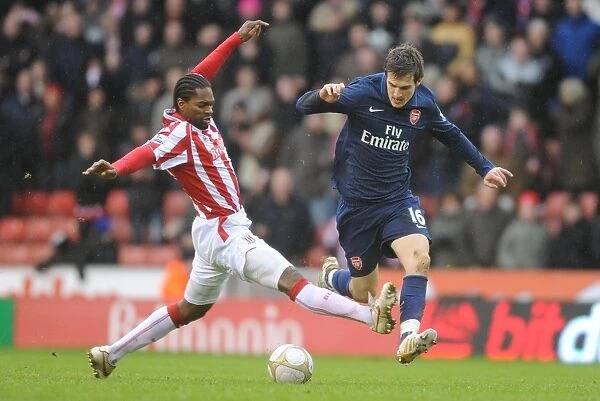 Aaron Ramsey (Arsenal) Salif Diao (Stoke). Stoke City 3:1 Arsenal, FA Cup 4th round