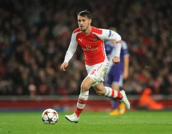 Framed Print : Aaron Ramsey: Arsenal Star in Action against RSC Anderlecht, UEFA Champions League, 2014 Framed Print : Aaron Ramsey: Arsenal Star in Action against RSC Anderlecht, UEFA Champions League, 2014