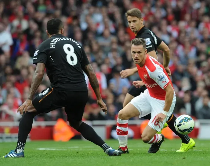 Framed Print : Aaron Ramsey (Arsenal) Tom Huddlestone (Hull). Arsenal 2: 2 Hull City. Barclays Premier League