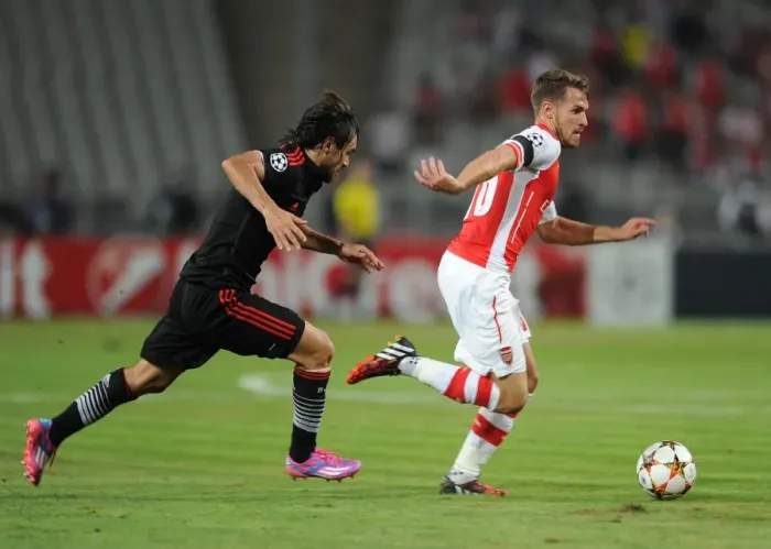 Framed Print : Aaron Ramsey (Arsenal) Veli Kavlak (Besiktas). Besiktas 0: 0 Arsenal. UEFA Champions Framed Print : Aaron Ramsey (Arsenal) Veli Kavlak (Besiktas). Besiktas 0: 0 Arsenal. UEFA Champions