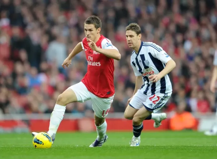 Framed Print : Aaron Ramsey (Arsenal) Zoltan Gera (WBA). Arsenal 3: 0 West Bromwich Albion Framed Print : Aaron Ramsey (Arsenal) Zoltan Gera (WBA). Arsenal 3: 0 West Bromwich Albion