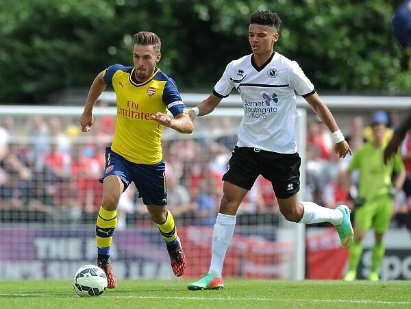 Aaron Ramsey Breaks Past Lee Angol: Borehamwood vs Arsenal Pre-Season Clash