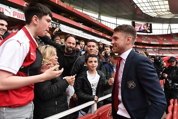 Aaron Ramsey Celebrates with Arsenal Fans: Victory over Brighton & Hove Albion, Premier League 2018-19