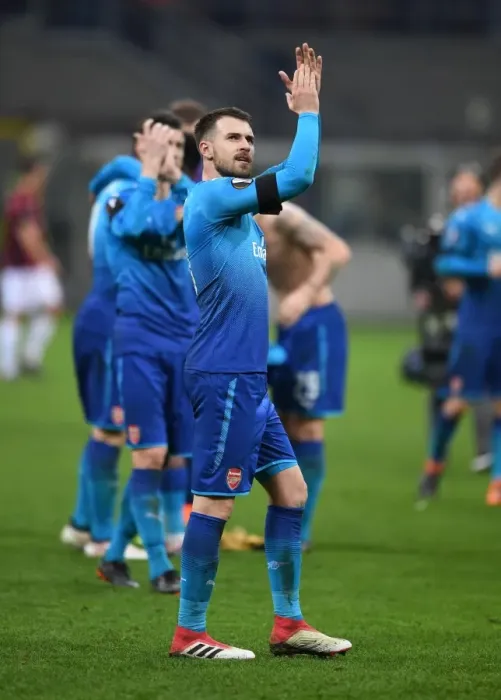 Framed Print : Aaron Ramsey Celebrates with Arsenal Fans after AC Milan Showdown in Europa League Framed Print : Aaron Ramsey Celebrates with Arsenal Fans after AC Milan Showdown in Europa League