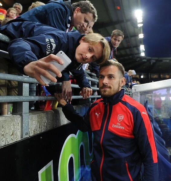 Aaron Ramsey Celebrates with Arsenal Fans after Viking FK Victory, 2016