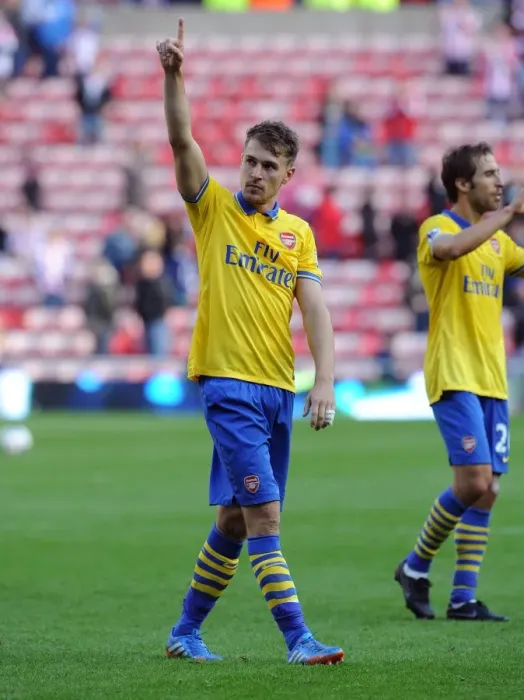 Framed Print : Aaron Ramsey Celebrates after Arsenal's Victory over Sunderland (2013-14) Framed Print : Aaron Ramsey Celebrates after Arsenal's Victory over Sunderland (2013-14)