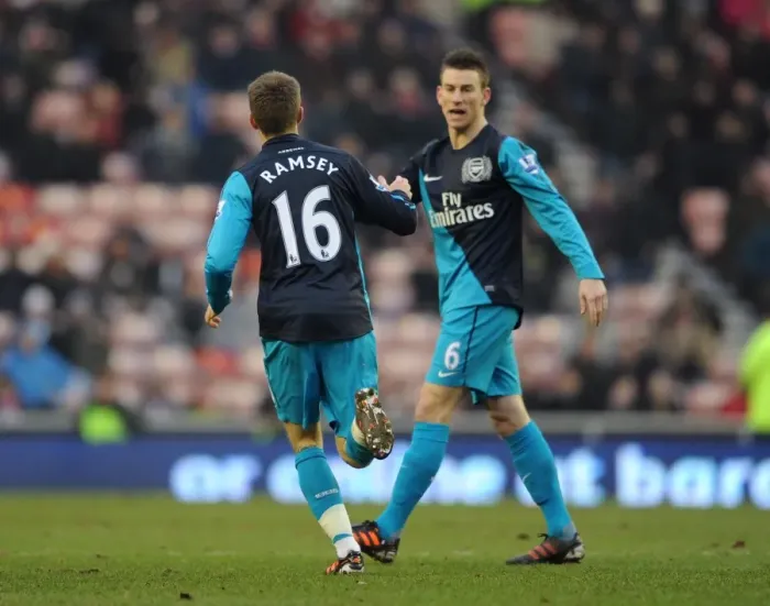Framed Print : Aaron Ramsey celebrates scoring Arsenals 1st goal with Laurent Koscielny