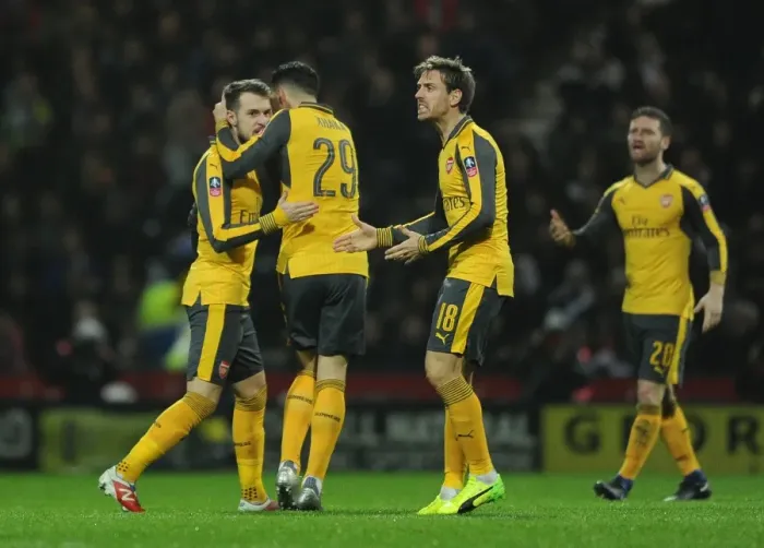Framed Print : Aaron Ramsey celebrates scoring a goal for Arsenal. Preston North End 1: 2 Arsenal