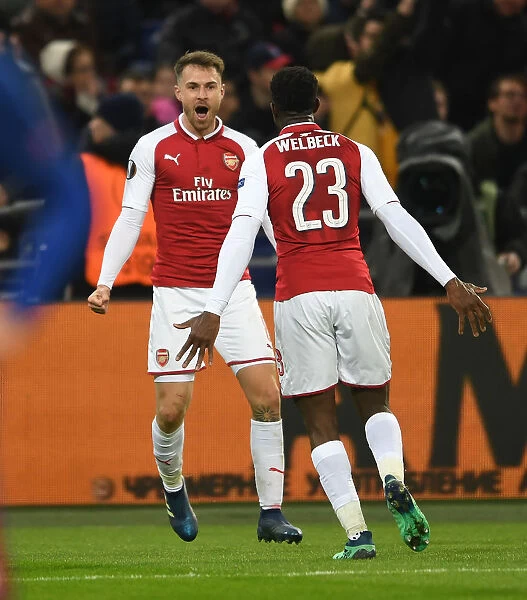 Aaron Ramsey and Danny Welbeck Celebrate Arsenal's Europa League Goals Against CSKA Moscow