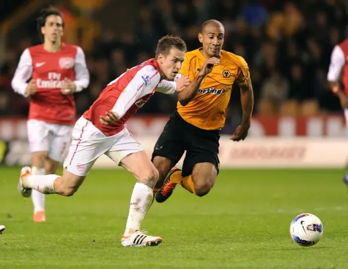 Framed Print : Aaron Ramsey Dashes Past Carl Henry: Intense Moment from Wolverhampton Wanderers vs. Arsenal (2011-12)