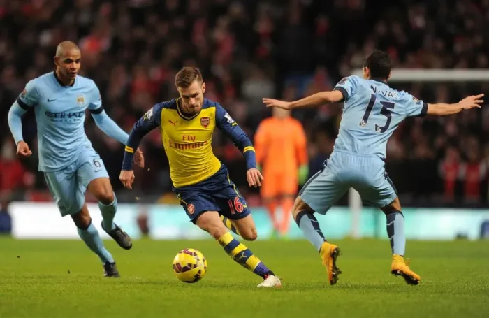 Framed Print : Aaron Ramsey Dodges Past Jesus Navas and Fernando: Manchester City vs Arsenal, Premier League 2014-15 Framed Print : Aaron Ramsey Dodges Past Jesus Navas and Fernando: Manchester City vs Arsenal, Premier League 2014-15
