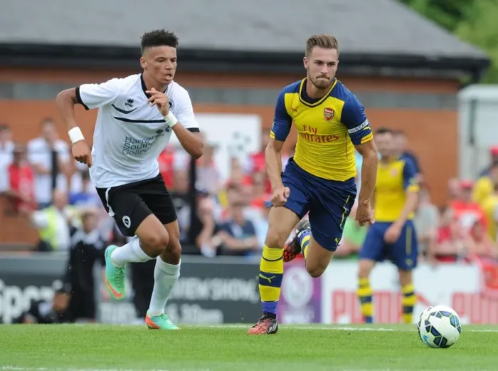Framed Print : Aaron Ramsey Faces Off Against Lee Angol: Borehamwood vs Arsenal Pre-Season Clash Framed Print : Aaron Ramsey Faces Off Against Lee Angol: Borehamwood vs Arsenal Pre-Season Clash