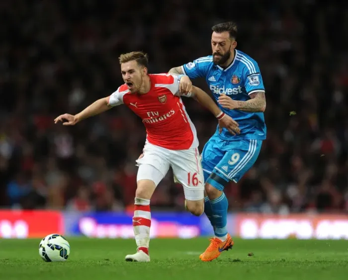 Framed Print : Aaron Ramsey Foul by Steven Fletcher: Arsenal vs Sunderland, Premier League 2014-15