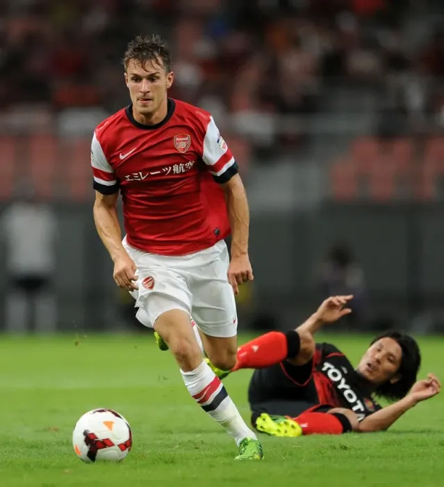 Framed Print : Aaron Ramsey Outmaneuvers Jungo Fujimoto: Nagoya Grampus vs. Arsenal (2013) Framed Print : Aaron Ramsey Outmaneuvers Jungo Fujimoto: Nagoya Grampus vs. Arsenal (2013)