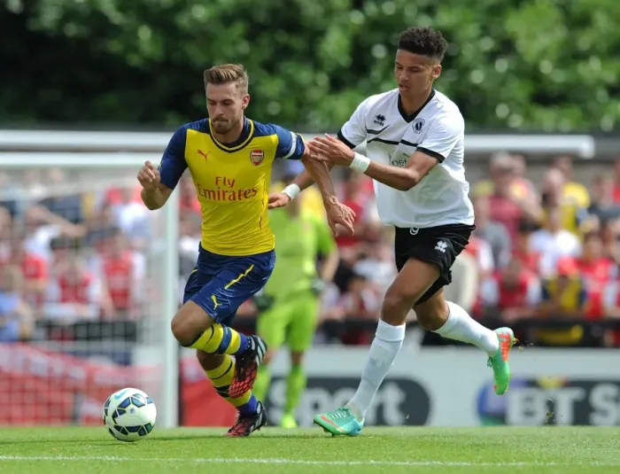 Framed Print : Aaron Ramsey Outmaneuvers Lee Angol: Borehamwood vs Arsenal Pre-Season Clash