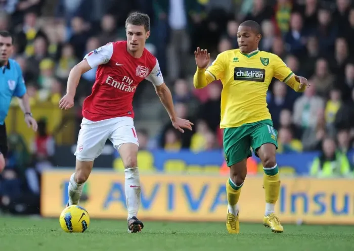 Framed Print : Aaron Ramsey Outmaneuvers Simeon Jackson: Norwich City vs. Arsenal, Premier League 2011-12