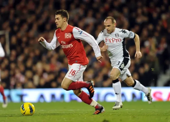 Framed Print : Aaron Ramsey Outpaces Danny Murphy: Fulham vs. Arsenal, Premier League 2011-12 Framed Print : Aaron Ramsey Outpaces Danny Murphy: Fulham vs. Arsenal, Premier League 2011-12