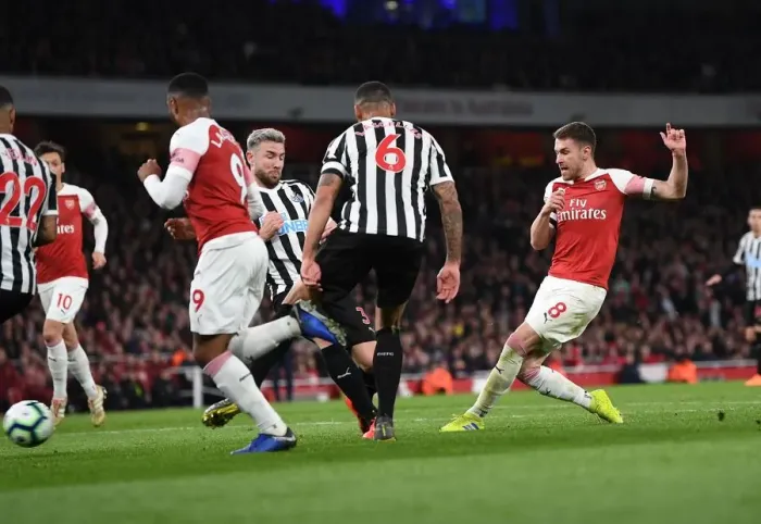Framed Print : Aaron Ramsey Scores for Arsenal Against Newcastle United in Premier League Framed Print : Aaron Ramsey Scores for Arsenal Against Newcastle United in Premier League