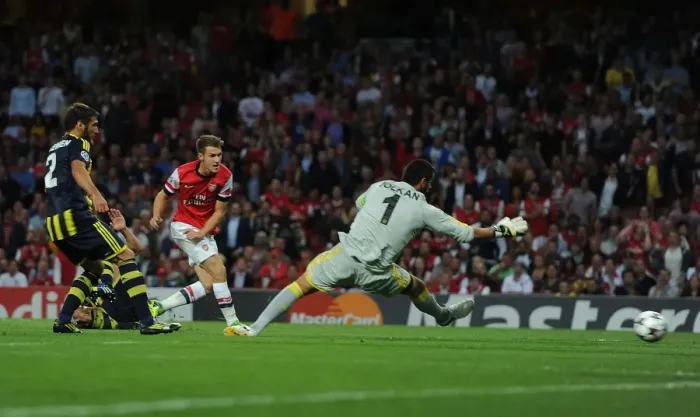 Framed Print : Aaron Ramsey Scores the Opener: Arsenal vs. Fenerbahce, UEFA Champions League Play-offs (2013) Framed Print : Aaron Ramsey Scores the Opener: Arsenal vs. Fenerbahce, UEFA Champions League Play-offs (2013)