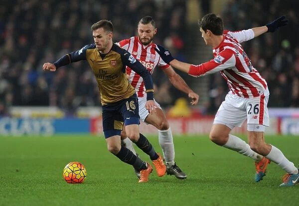 Aaron Ramsey Scores Past Stoke's Jakob Haugaard: Arsenal's Thrilling Goal in the Premier League 2015-16 Match Against Stoke City