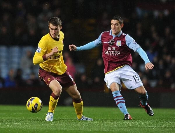Aaron Ramsey vs. Ashley Westwood: Intense Battle at Villa Park (Aston Villa v Arsenal, Premier League 2012-13)