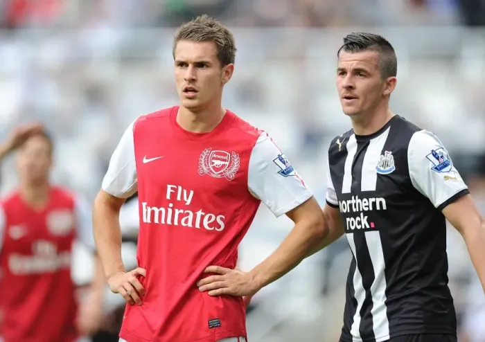 Framed Print : Aaron Ramsey vs Joey Barton: Intense Battle in Newcastle United vs Arsenal (2011-12)