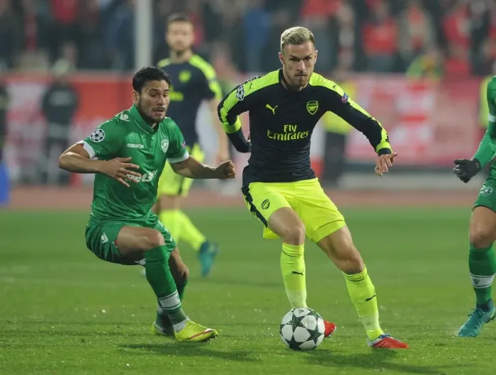 Framed Print : Aaron Ramsey vs. Jose Luis Palomino: Battle in the UEFA Champions League between Arsenal and Ludogorets