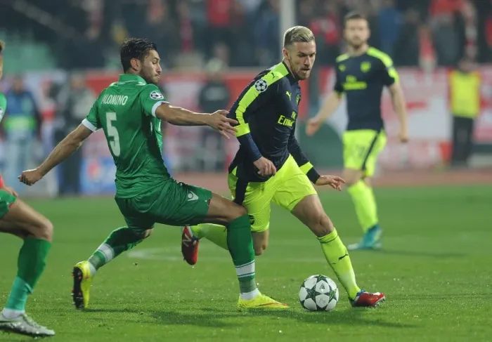 Framed Print : Aaron Ramsey vs. Jose Luis Palomino: A UEFA Champions League Showdown