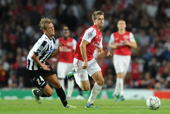 Framed Print : Aaron Ramsey vs Medhi Benatia: Clash of the Champions League Titans (2011)