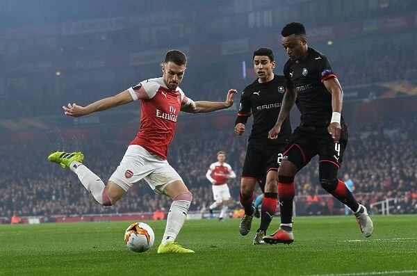 Aaron Ramsey vs Mexer: Intense Battle at Emirates Stadium - Arsenal vs Stade Rennais, UEFA Europa League 2019
