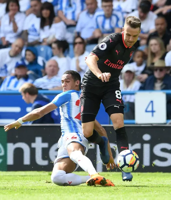Framed Print : Aaron Ramsey vs. Tom Ince: Intense Battle in Huddersfield Town vs. Arsenal (Premier League, 2017-18)