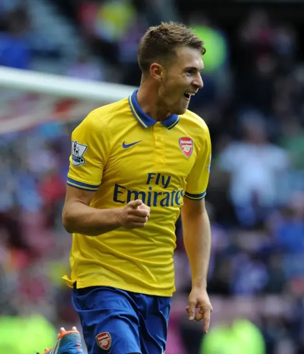 Framed Print : Aaron Ramsey's Brace: Arsenal's Dominance Over Sunderland in 2013-14 Premier League