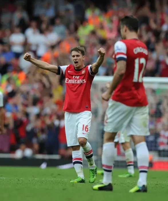 Framed Print : Aaron Ramsey's Celebration: Arsenal's Victory over Tottenham Hotspur (2013-14)