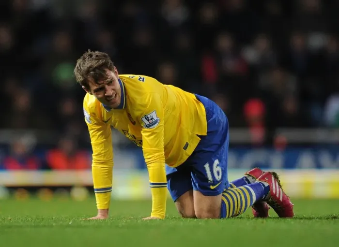 Framed Print : Aaron Ramsey's Christmas Misfortune: Injured in Arsenal's Battle against West Ham United (2013-14)