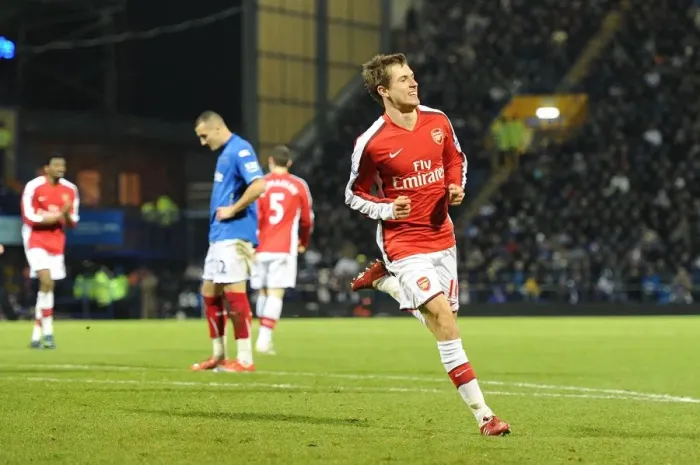 Framed Print : Aaron Ramsey's Triumphant Goal: Arsenal Crushes Portsmouth 4-1 in Premier League Framed Print : Aaron Ramsey's Triumphant Goal: Arsenal Crushes Portsmouth 4-1 in Premier League